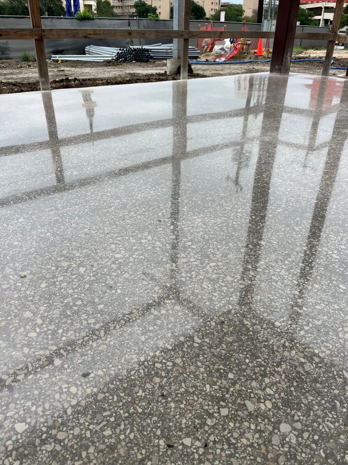 Polished Concrete — Salt-and-pepper finish, commercial build